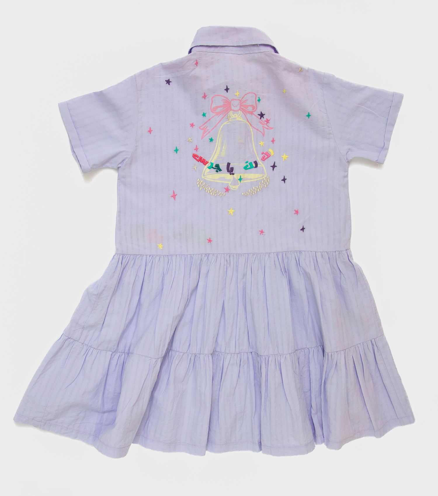 Light purple toddler dress with embroidered colorful bell and stars on back with short sleeves and tiered skirt