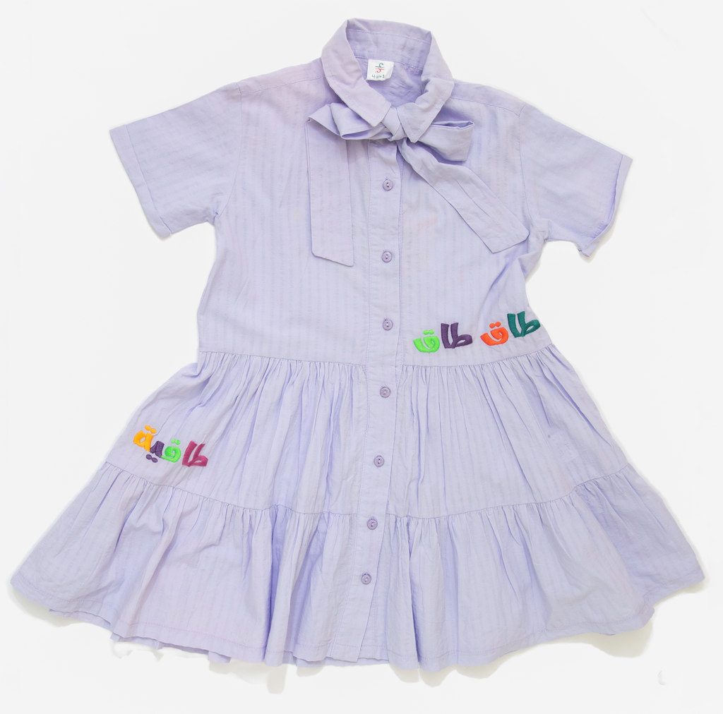 Light purple short sleeve girls dress with button front and colorful embroidered designs